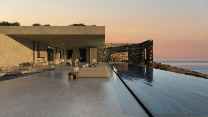 Au coucher du soleil, la géométrie de la maison se reflète sur l’eau, accentuant son lien avec la topographie. Crédit photo : ONUS Architecture Studio